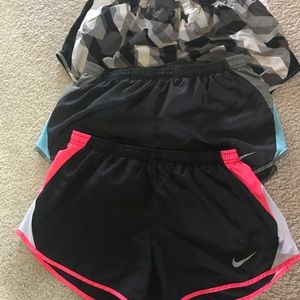 Three pair women’s Nike running shorts